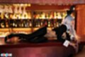 Bunny girl stretched out on bar teasing cock