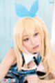 Mizuki holding cock looking up