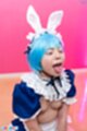 Misa on her knees tongue out cum on her face small tits