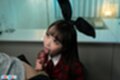 Ria kurumi kneeling looking up licking cock
