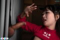 Ria kurumi looking at hard cock hand raised