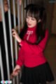 Giving handjob wearing red top