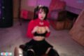 On her knees raising top over bra breasts exposed