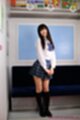 Kogal standing wearing uniform hands clasped