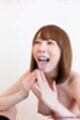 Kisaki aya raising hands cum on her hands tongue out