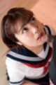 On her knees looking up wearing kogal uniform
