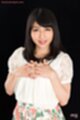 Hands clasped on her chest.jpeg