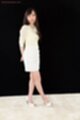 Yada chiemi in high heels hands behind her back.jpeg