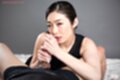 Enami ryu holding spent cock cum on her hands
