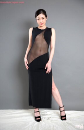 Enami Ryu in sheer black dress on her knees giving handjob and licking cum