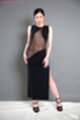 Wearing sheer black dress in high heels