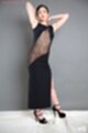 Enami ryu in sheer black dress arms raised wearing black high heels