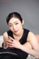 Enami ryu on her knees fingers splayed out around hard cock