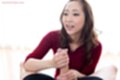 Giving handjob on her knees