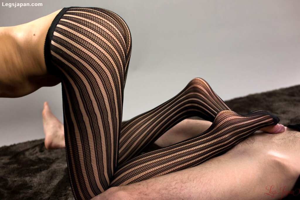 On all fours teasing cock in pantyhose