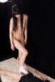Kurihara moeka standing nude looking down long hair falling over her small breasts giving footjob wearing white socks