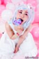 Minano ai on her knees wearing dress licking lolipop