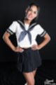 Kogal in uniform hands on her hips