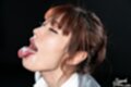 Tongue extended cum in her mouth
