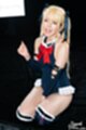 On her knees hair in pigtails