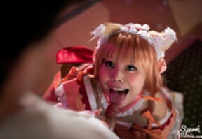 Misa on her knees giving handjobs and sucking cocks