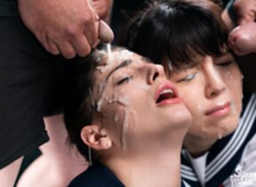 Mary and Scott Kristen kneeling in uniform taking bukkake facial cumshots