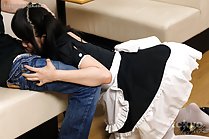 Maid on her knees performing oral sex in uniform