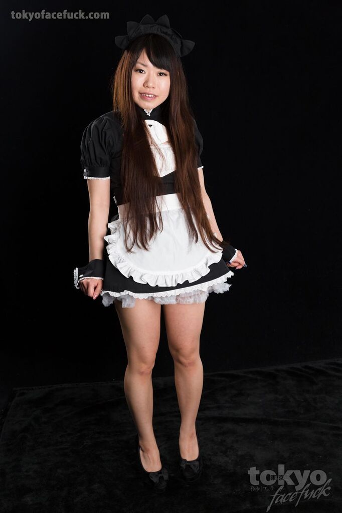 Maid playing with skirt hem