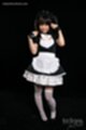Maid with hands raised