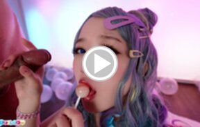 Ria Kurumi sucking lollipop while giving handjob
